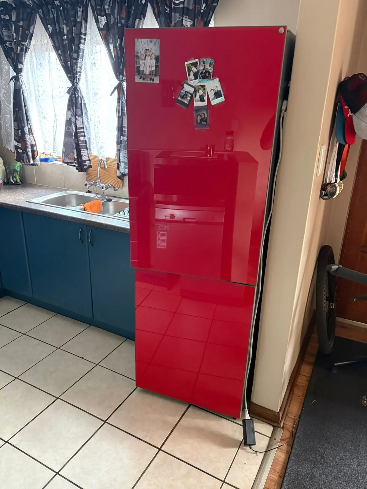 Red retro refrigerator inspected during a recent service call
